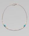 From the Aspasia Collection. A sterling silver chain link with hammered 18K gold, fleur di lis, and turquoise accents.18K yellow gold Turquoise Sterling silver Length, about 18 Toggle closure Made in Greece 