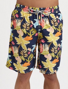 You'll be prepared for fun in the sun, sea and beyond in these tropical print trunks, set in quick-drying nylon with rear eyelets to avoid ballooning effect.Elastic drawstring waistSide slash, back flap pocketInseam, about 9Polyamide nylonMachine washImported You'll be prepared for fun in the sun, sea and beyond in these tropical print trunks, set in quick-drying nylon with rear eyelets to avoid ballooning effect.Elastic drawstring waistSide slash, back flap pocketInseam, about 9Polyamide nylonMachine washImported
