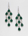 From the Emerald City Collection. Faceted teardrops in emerald green, punctuated by tiny clear stones to create delicious dazzle.Glass and plasticSilvertoneLength, about 3.25Ear wireImported