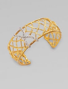 A pretty crystal accented cuff with delicate branches of pavé Swarovski cystals. 18k goldplated brass Length, about 6½ adjustable Width, about 1 Imported 