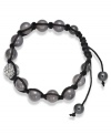 Spiritual-inspired bracelets are all the rage this season! Snap up this hot style from Ali Khan featuring semi-precious grey agate beads and pave glass fireballs on a trendy black cord. Bracelet adjusts to fit the wrist. Approximate diameter: 2 inches. Approximate length: 12-1/4 inches.