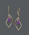 A regal look. Earrings feature bezel-set amethyst drops (1-3/4 ct. t.w.) crafted in a dainty 14k gold hoop setting. Approximate drop: 1-1/2 inches.
