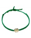 Luck stars in this bracelet. A 14k gold shamrock shines brightly in the center of this green nylon rope for a whimsically stylish effect. Bracelet adjusts to fit wrist. Approximate diameter: 3-1/2 inches.