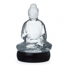 An exquisite, limited edition crystal idol of the Buddha seated in lotus position exudes a meditative calm for a dose of serenity and shimmering opulence. An exquisite, limited edition crystal idol of the Buddha seated in lotus position exudes a meditative calm for a dose of serenity and shimmering opulence.