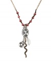 Snake charmer. A sleek serpent motif sets the tone for Lucky Brand's exotic charm necklace. Adorned with rock crystals and freshwater pearls, it's set in gold tone and silver tone mixed metal. Approximate length: 21 inches + 2-inch extender. Approximate drop: 3-1/10 inches.