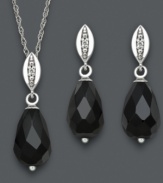 Dramatic drops add depth to your look. Faceted onyx (8 mm x 12 mm) and sparkling diamond accents adorn this matching pendant and drop earrings set. Crafted in sterling silver. Approximate length: 18 inches. Approximate pendant drop: 3/4 inch. Approximate earring drop: 3/4 inch.