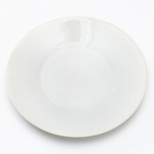 Vuelta White Pearl by Jars is a contemporary white collection featuring the company's signature crackled texture and glass-like glaze over a ceramic body. Jars is now in its fourth-generation of family leaders whose mission is to create unique, modern dinnerware to suit current lifestyles.