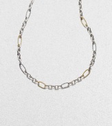 A bold and smart combination of cabled and smooth, large and small oval links in sterling silver and 18k yellow gold. 18k yellow gold and sterling silver Length, about 32 Lobster clasp Made in USA