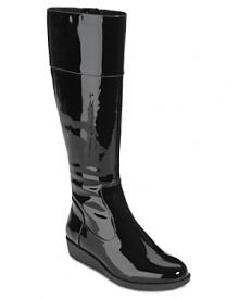 Rain-slick patent leather makes Cole Haan's weather boots a shining example of gloomy day style. Rain-slick patent leather makes Cole Haan's weather boots a shining example of gloomy day style.