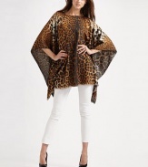 Luxuriously soft cashmere/virgin wool woven in an exotic leopard print with baby fringe trim.Pullover About 55 x 70¾ 52% cashmere/48% virgin wool Dry clean Made in Italy 
