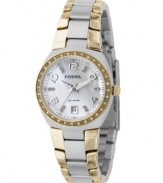 A gem of a watch, from Fossil. With a beautiful two-tone design highlighted by crystal accents, this women's watch features a stainless steel silvertone bracelet with goldtone accent. Round stainless steel silvertone case and Swarovski crystal-accented bezel. Mother-of-pearl dial with logo, date window, numerical and crystal accent indices. Quartz movement. Water resistant to 100 meters. 11-year limited warranty.