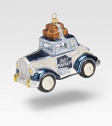 An old fashioned honeymoon limo shapes this stylish glass ornament. About 4W X 5H Made in Poland