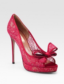 A beautiful bow defines this peep toe silhouette of feminine lace trimmed in satin, elevated with a sturdy platform. Self-covered heel, 5 (125mm)Covered platform, ¾ (20mm)Compares to a 4¼ heel (110mm)Lace upper with satin trimPeep toeLeather lining and solePadded insoleMade in ItalyOUR FIT MODEL RECOMMENDS ordering true size. A beautiful bow defines this peep toe silhouette of feminine lace trimmed in satin, elevated with a sturdy platform. Self-covered heel, 5 (125mm)Covered platform, ¾ (20mm)Compares to a 4¼ heel (110mm)Lace upper with satin trimPeep toeLeather lining and solePadded insoleMade in ItalyOUR FIT MODEL RECOMMENDS ordering true size.