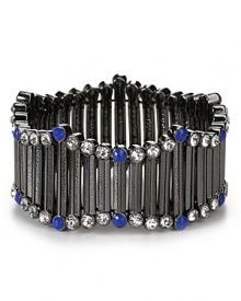 Give your an electric hit with Aqua's hematite-plated stretch bracelet. With stretch bars and fluorescent studs, this cuff is a tows the line between bold and blinding. Give your an electric hit with Aqua's hematite-plated stretch bracelet. With stretch bars and fluorescent studs, this cuff is a tows the line between bold and blinding.