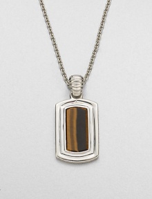 Shiny sterling silver frames a center tigers' eye stone, handsomely suspended from a link chain.Sterling silverTigers' eyeLength, about 22Pendant size, about 1 x ½Imported Shiny sterling silver frames a center tigers' eye stone, handsomely suspended from a link chain.Sterling silverTigers' eyeLength, about 22Pendant size, about 1 x ½Imported