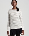 The creamy hue of this Theory sweater brings effortless 7-day style to your season. Dress it up with a crisp tweed mini wear it ladi-back with your favorite skinny jeans.