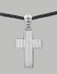 A ridged cross pendant crafted in polished silver hangs from a woven cord of soft leather. From the Bedeg Collection Silver Leather Pendant, 1W X 2¼H Necklace, adjustable 26-28 Lobster clasp Imported A ridged cross pendant crafted in polished silver hangs from a woven cord of soft leather. From the Bedeg Collection Silver Leather Pendant, 1W X 2¼H Necklace, adjustable 26-28 Lobster clasp Imported