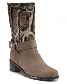Animal-printed haircalf and soft leather add uptown style to a classic Western silhouette. By Stuart Weitzman. Animal-printed haircalf and soft leather add uptown style to a classic Western silhouette. By Stuart Weitzman.