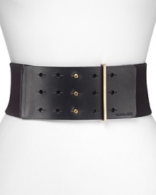 Structure sleek body-con silhouettes with this MICHAEL Michael Kors belt, combining edgy elastic and leather for serious waist-cinching that lets you breathe. Structure sleek body-con silhouettes with this MICHAEL Michael Kors belt, combining edgy elastic and leather for serious waist-cinching that lets you breathe.