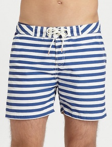 Summertime essential in a crisp, cotton blend finished in bold stripes for a nautical-inspired feel.Drawstring-tie waistSide slash, back welt pocketsInseam, about 465% cotton/35% nylonMachine washImported