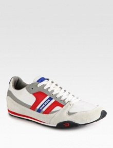 Make a bold statement in this eye-catching casual style of premium leather and suede with signature logo detail.Leather upperPadded insoleRubber soleImported Make a bold statement in this eye-catching casual style of premium leather and suede with signature logo detail.Leather upperPadded insoleRubber soleImported