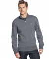 Layer up! This solid quarter zip pullover form Calvin Klein will keep you trendy throughout the cooler seasons.