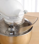 Less mess means less stress. This handy pouring shield attachment for your KitchenAid stand mixer, made of rugged plastic with a new single piece design, helps pour ingredients and prevent messes while baking. The innovative shape creates a chute that channels ingredients directly into the bowl and minimizes splatter. Lifetime warranty.