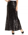 Calvin Klein's sequined maxi skirt makes a sparkling statement at parties this season.