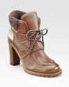 Mix pebble-grain leather with soft wool trim and contrasting laces for an extra dose of attitude. Stacked heel, 3½ (90mm)Leather upper with wool trimLeather liningRubber trek solePadded insoleImportedOUR FIT MODEL RECOMMENDS ordering one half size up as this style runs small. 
