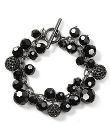 Let Carolee's clustered bracelet add texture to your day-to-day look. Showcase this striking piece against a white cuff--roll up the sleeves for maximum impact. Let Carolee's clustered bracelet add texture to your day-to-day look. Showcase this striking piece against a white cuff--roll up the sleeves for maximum impact.