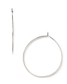 A striking yet slim silhouette makes these classic hoop earrings feminine and refined. From MICHAEL Michael Kors. A striking yet slim silhouette makes these classic hoop earrings feminine and refined. From MICHAEL Michael Kors.
