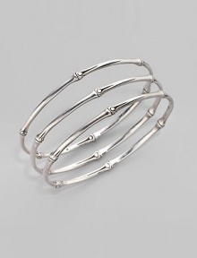 From the Bamboo Collection. Slim and elegant in fine sterling silver, this set of three bangles displays the graceful pattern of bamboo. This design was expressly created to support an afforestation project on Nusa Penida, an arid island off the coast of Bali. For every purchase, John Hardy will donate a portion of the retail price to the cost of planting bamboo. This bangle set helped plant 6 bamboo seedlings. Sterling silver Diameter, about 2½ Set of 3 Made in Bali From the Bamboo Collection. Slim and elegant in fine sterling silver, this set of three bangles displays the graceful pattern of bamboo. This design was expressly created to support an afforestation project on Nusa Penida, an arid island off the coast of Bali. For every purchase, John Hardy will donate a portion of the retail price to the cost of planting bamboo. This bangle set helped plant 6 bamboo seedlings. Sterling silver Diameter, about 2½ Set of 3 Made in Bali