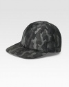 A sporty baseball cap crafted in camouflaged nylon with tonal colors and contemporary appeal. Stitched brim Made in Italy