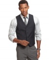 Check off sophisticated, suited-up style with this sleek slim-fit vest from Alfani Red.