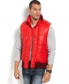 A warm puffer design with a knit make this Sean John vest cozy and cool.