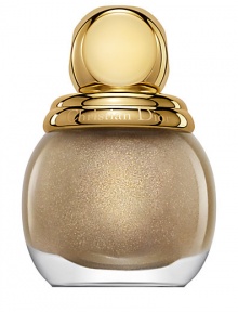 The whimsical and playful masquerade balls of his time, embodied Christian Dior's love of surprise and elegance. Today, the House of Dior embodies that same sense of extravagant splendor with a golden holiday collection of limited edition items. Diorific Vernis Nail Lacquers are vibrant, high-shine nail lacquers encased in precious glass bottles accented with gold toppers. They leave your nails perfectly polished for the Dior Grand Ball. The whimsical and playful masquerade balls of his time, embodied Christian Dior's love of surprise and elegance. Today, the House of Dior embodies that same sense of extravagant splendor with a golden holiday collection of limited edition items. Diorific Vernis Nail Lacquers are vibrant, high-shine nail lacquers encased in precious glass bottles accented with gold toppers. They leave your nails perfectly polished for the Dior Grand Ball.