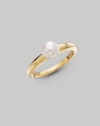 From the Classic Elegance Collection. A design that could hardly be simple, with one lustrous white Akoya pearl perched atop a sleek gold band. 6.5mm white, round cultured pearl Quality: A+ 18k yellow gold Imported