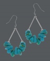 Splash into hues perfect for summer. Avalonia Road earrings feature turquoise nuggets strung from a sterling silver setting. Approximate drop: 1-3/4 inches.