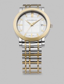Silver dial etched with 18k gold accents on two-tone stainless steel bracelet. Quartz movement Round case Date display Second hand Markers Made in Switzerland Silver dial etched with 18k gold accents on two-tone stainless steel bracelet. Quartz movement Round case Date display Second hand Markers Made in Switzerland