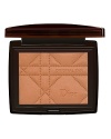 Just in time for resort season. The first bronzing powder that actually works to improve skin color and quality for a natural, vacation-fresh, tanned look, all year long. Formulated with Dior's exclusive Sun Minerals Technology, new Original Tan blends seamlessly with your skin. Silky smooth and flawless. 4 sunkissed shades stamped in Dior's famous cannage quilt pattern in gleaming black compacts. So sun-sational. So Dior.