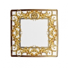 The most legendary figure of Asian mythology, the red dragon rises majestically from this fabulously opulent dinnerware from Rosenthal Meets Versace, conveying all its might and glory. Each piece features ornate golden baroque patterns and four small medallions representing the sun, and the Versace medusa decorates the background. The most legendary figure of Asian mythology, the red dragon rises majestically from this fabulously opulent dinnerware from Rosenthal Meets Versace, conveying all its might and glory. Each piece features ornate golden baroque patterns and four small medallions representing the sun, and the Versace medusa decorates the background.