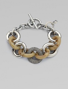 This mixed-media design features horn print acetate, sleek silvertone and rhinestone encrusted, graduated links. Steel and brassAcetateGlass stonesLength, about 8½Toggle closureImported This mixed-media design features horn print acetate, sleek silvertone and rhinestone encrusted, graduated links. Steel and brassAcetateGlass stonesLength, about 8½Toggle closureImported