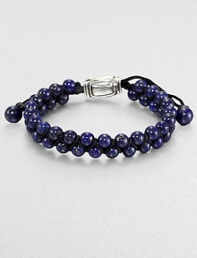 From the Spirited Bead Collection, this two-row beaded bracelet is handsomely crafted from 6mm lapis beads with an adjustable sterling silver beaded clasp.Sterling silverLapisAbout 9 longAbout 3 diam.Imported From the Spirited Bead Collection, this two-row beaded bracelet is handsomely crafted from 6mm lapis beads with an adjustable sterling silver beaded clasp.Sterling silverLapisAbout 9 longAbout 3 diam.Imported