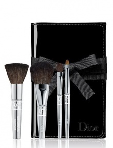 This deluxe travel brush set includes deluxe sizes of Dior's Backstage Powder, Cheek, Eyeshadow and Lip brushes in a foldable patent brush roll. This deluxe travel brush set includes deluxe sizes of Dior's Backstage Powder, Cheek, Eyeshadow and Lip brushes in a foldable patent brush roll.
