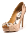 Sophisticated satin makes the Janni pumps a prime candidate for evening affairs. From Badgley Mischka.