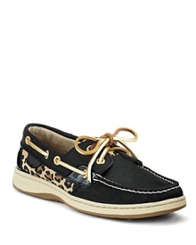 Sperry Top-Sider gives its classic boat shoes a bold dose of fashion with leopard print and patent accents. Sperry Top-Sider gives its classic boat shoes a bold dose of fashion with leopard print and patent accents.