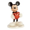 With a heart of bold red, Mickey Mouse shows he's totally smitten in this adorable Disney figurine. Glazed and glitter accents in Lenox fine china add even more to love.