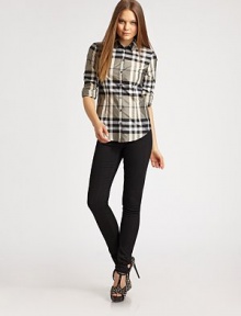 Bold check in a crisp, tailored look fitted with waist darts, front and back.Point collar Button front Button cuffs Shirttail hem 100% polyester Dry clean Imported