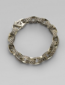 A contemporary spin on a sartorial classic, carved in links of sterling silver with thorn detail. Sterling silver Length, about 9 Diameter, about 3 Lobster clasp closure Imported A contemporary spin on a sartorial classic, carved in links of sterling silver with thorn detail. Sterling silver Length, about 9 Diameter, about 3 Lobster clasp closure Imported