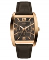 A casual timepiece from GUESS with rich leather and rosy hues that can upgrade your finest suit.